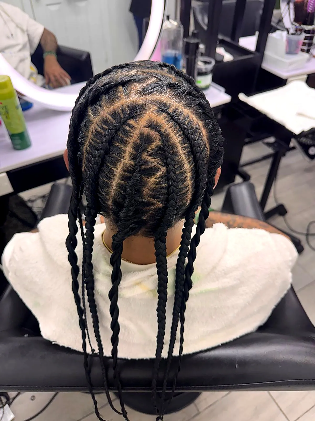 Neat stitch braids seen from the back